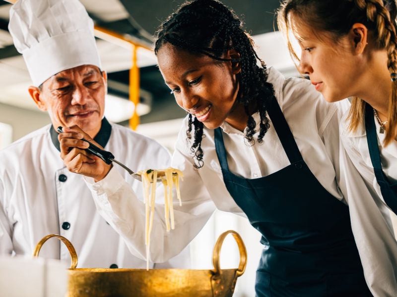 Chefs and hospitality staff working together in Aruba’s tourism industry