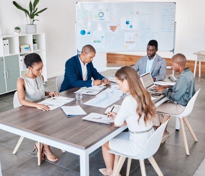 Work in Aruba 2026 — diverse professional team in meeting, Manpower 4U staffing agency Aruba